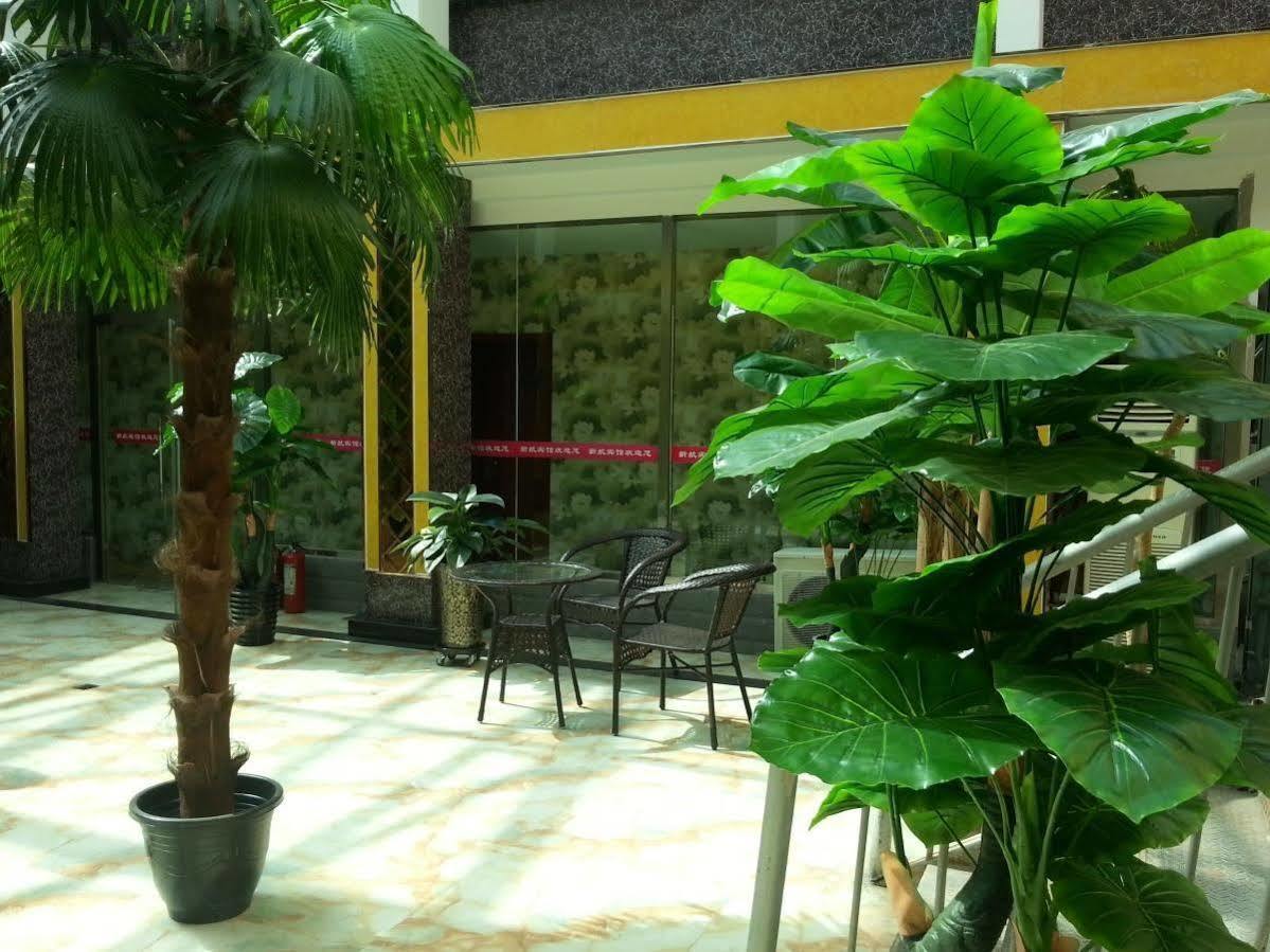 Xinhang Hotel Urumqi Esterno foto